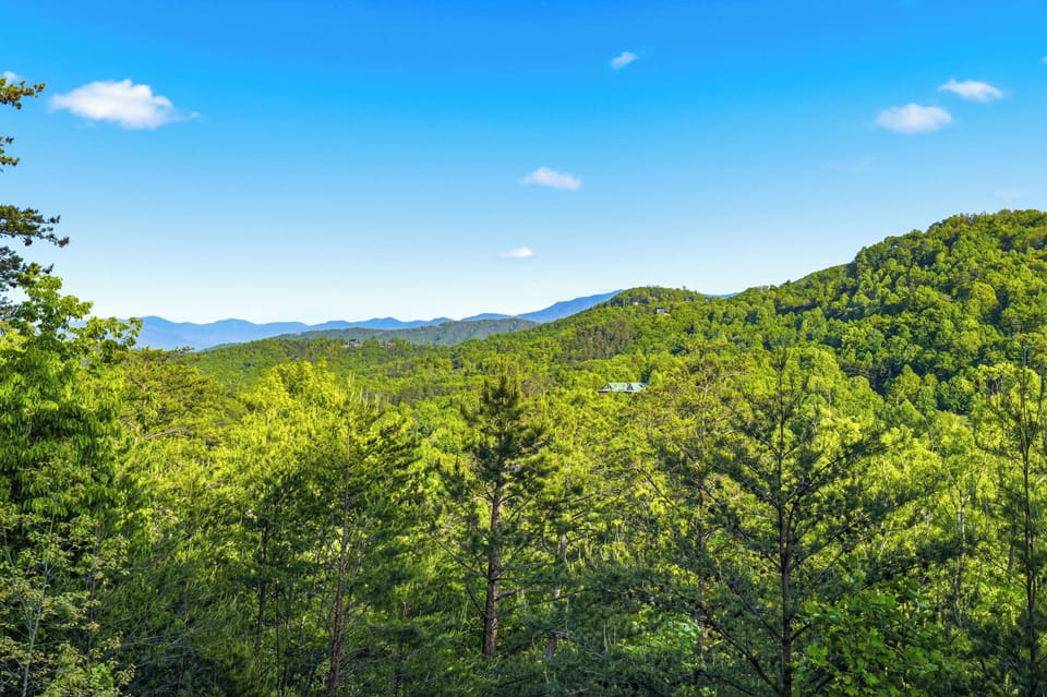 Main level deck with seating & Smoky Mountain views