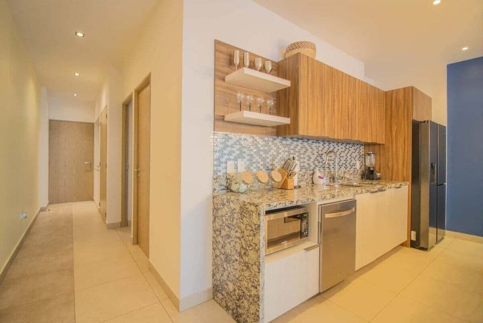 Foyer and kitchen.