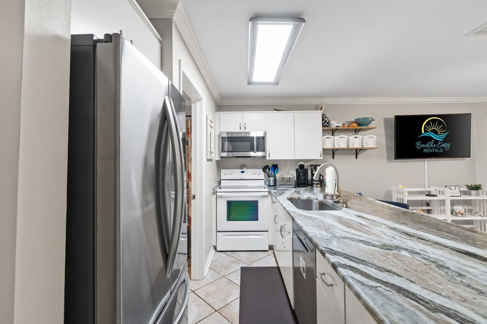 Cook with ease in our fully equipped kitchen, stocked with everything you need! 🍳✨
