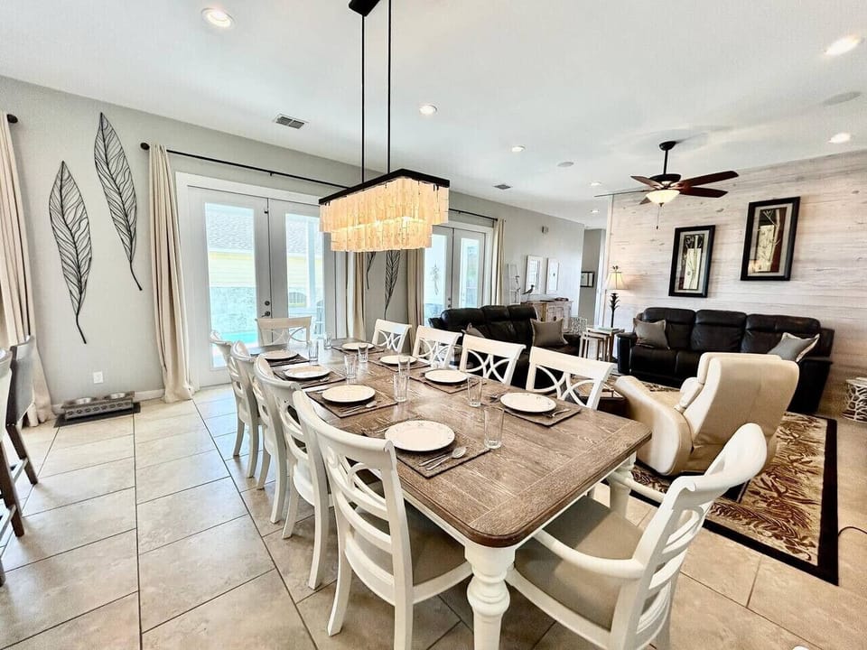 Gather around the large dining table for meals, memories, and more.