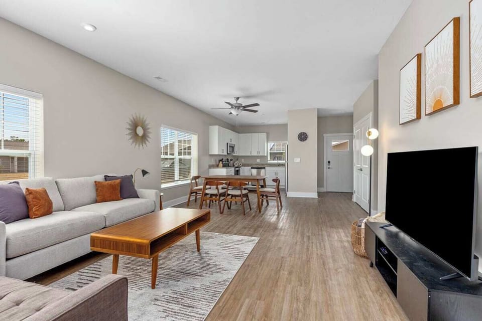 Spacious living and dining room with so much natural light!