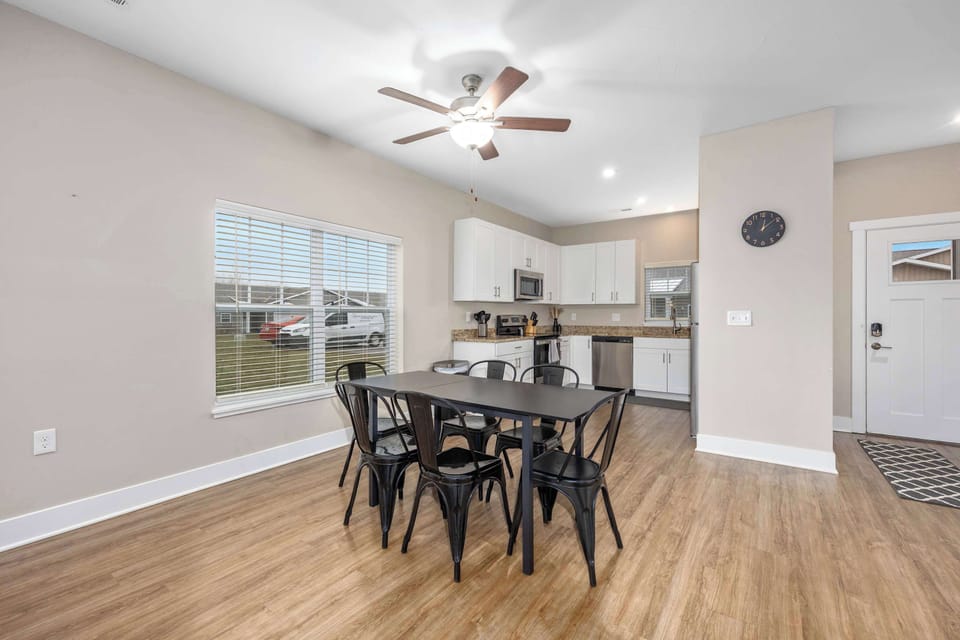 Dining space perfect for meals, morning coffee, or game night.