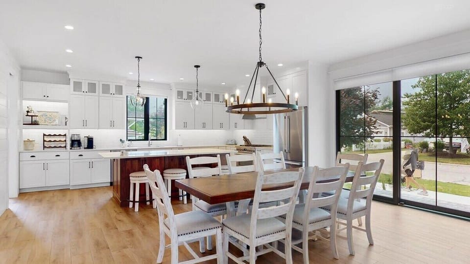 Chef's dream, fully equipped kitchen with seating for 12 people: 8 at the dining table and 4 at the island.