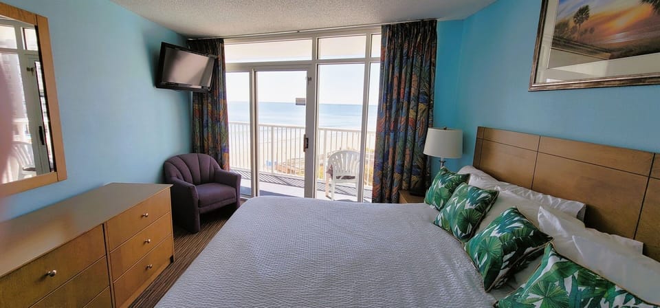 Let us share our Master Bedroom view with sliding doors to the balcony.