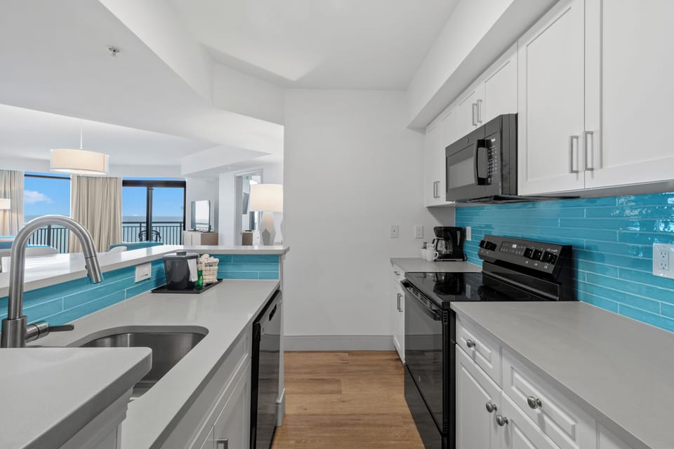 Oceanfront Four Bedroom Condo | Private kitchen | Fridge, microwave, coffee/tea maker