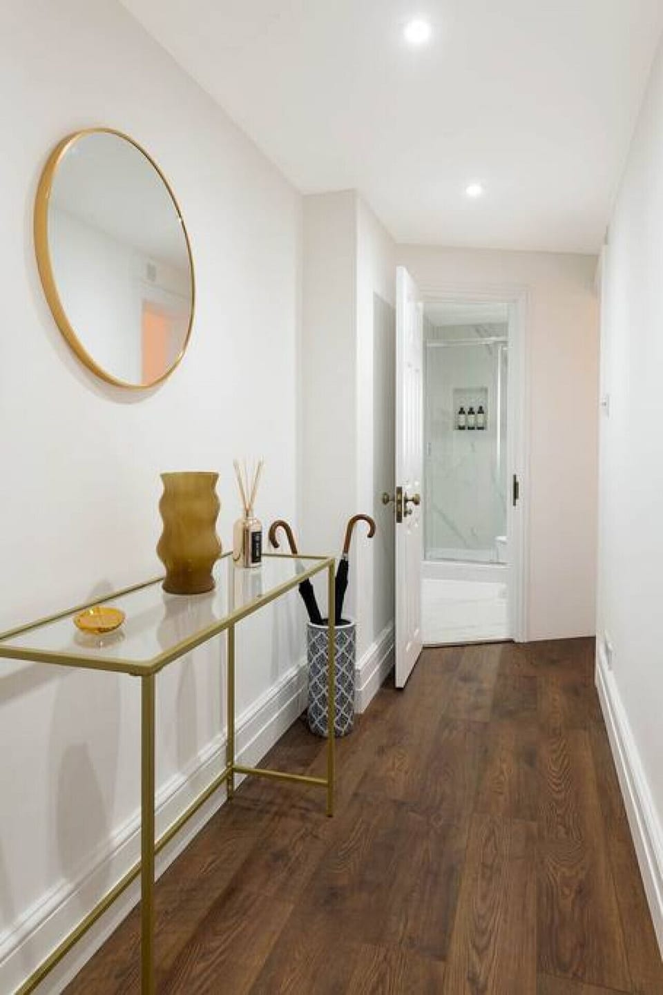 Kitchen | Fully Equipped Kitchen with Stone Work Surfaces | Bespoke Cabinetry | Hardwood Flooring | Hob | Oven | Microwave | Fridge-freezer | Dishwasher | Washer | Coffee Machine | Kettle | Cooking Utensils