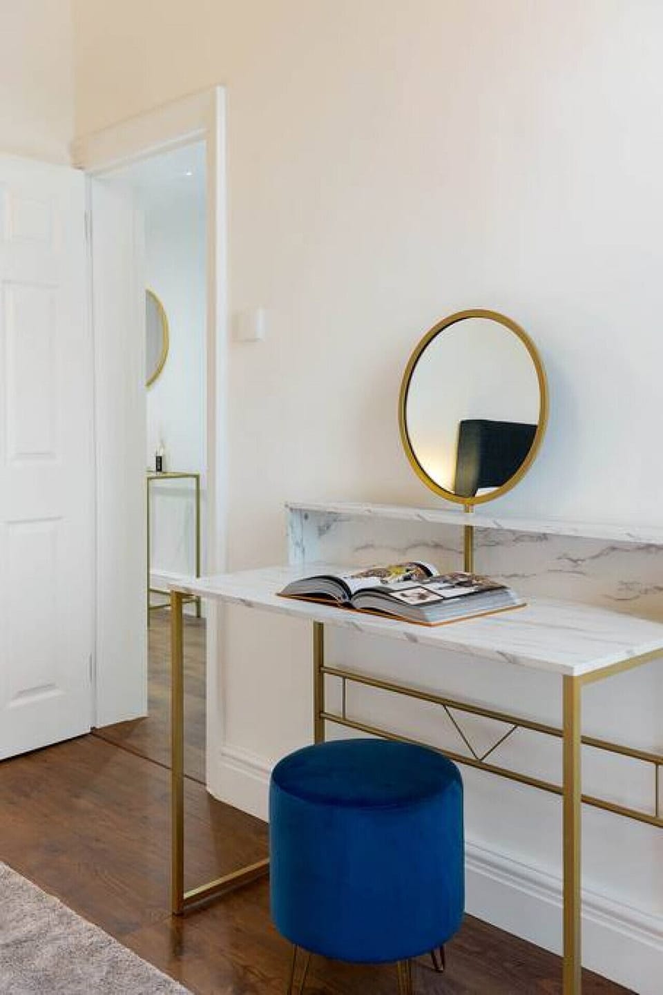 Bedroom | King Bed with Bespoke Fitted Wardrobe | Dressing Table | Wood Flooring | Blackout Blinds | Bedside Lamps | Curated Wall Art | High-Quality Linen Throughout