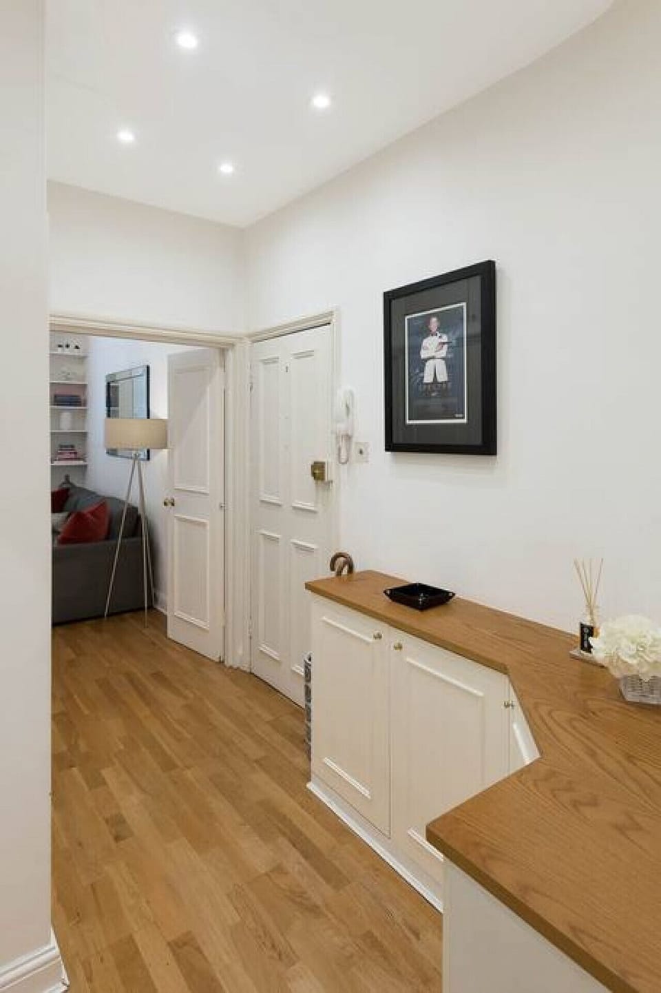 Apartment entrance hallway - umbrella stand, coat cupboard, shoe storage.