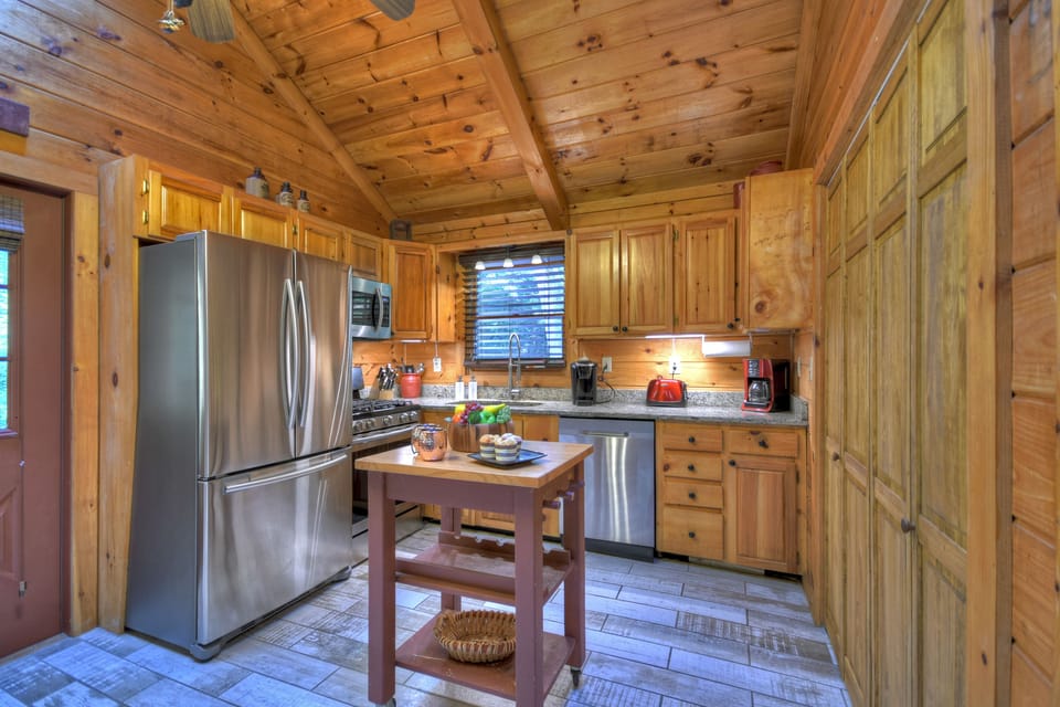 Fully furnished kitchen with stainless steel appliances
