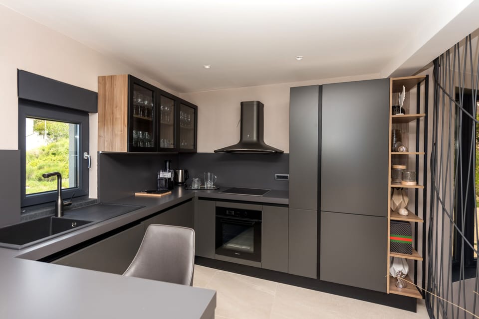 Exclusive Villa | Private kitchen | Full-size fridge, oven, stovetop, dishwasher