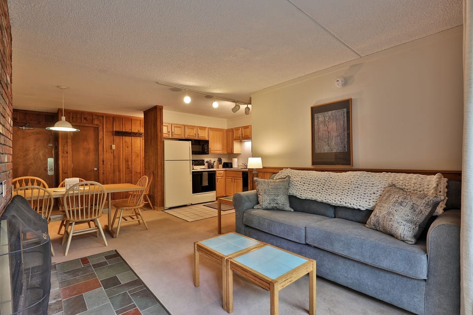 Perfect condo for families or groups of up to 6 guests in the Whiffletree Condos complex in Killington, VT. Relax in our cozy living room, complete with a plush couch and a warming fireplace.