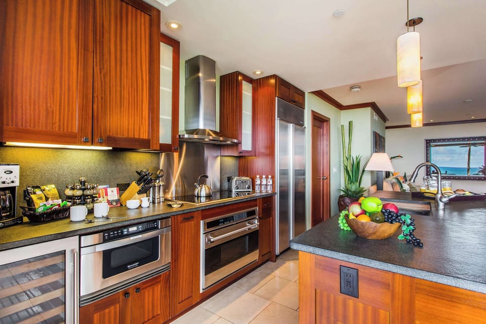 Condo, Multiple Beds, Patio, Ocean View (Hale Papakea) | Private kitchen | Coffee/tea maker, fridge, microwave, oven