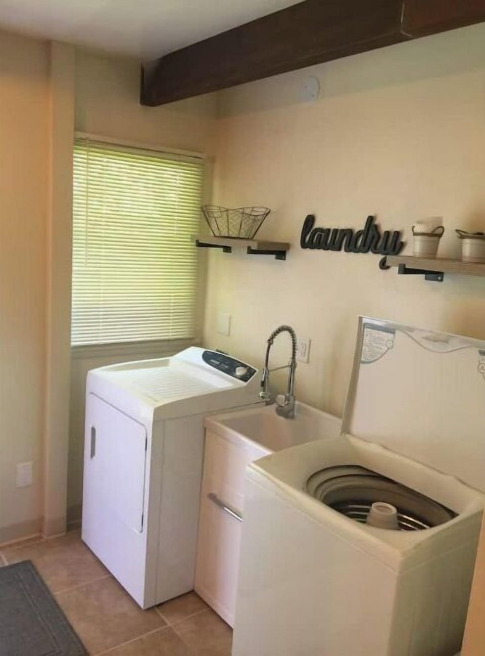 Laundry room (not shown: back door exit, work table w/ printer, & extra linens.