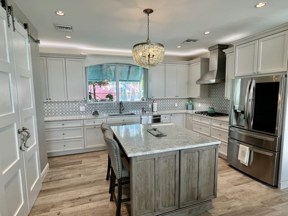 Kitchen with large island and pantry
