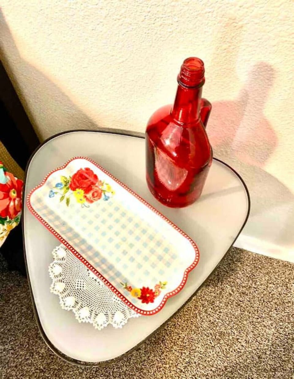 One of the two end tables beside the bed