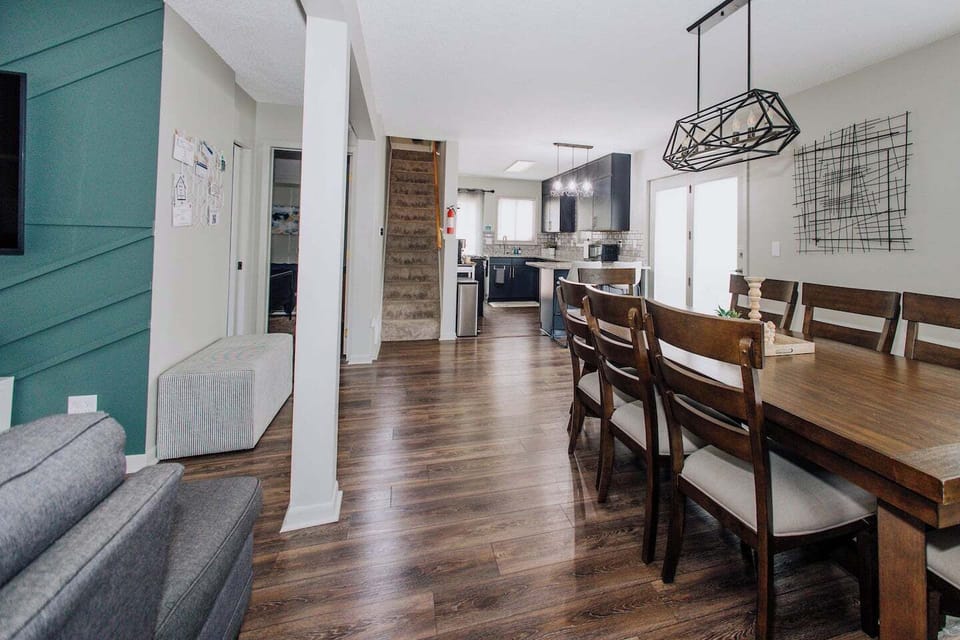Spacious open-concept main floor, perfect for small group gatherings. Unite around our grand dining table with your fellow travelers!