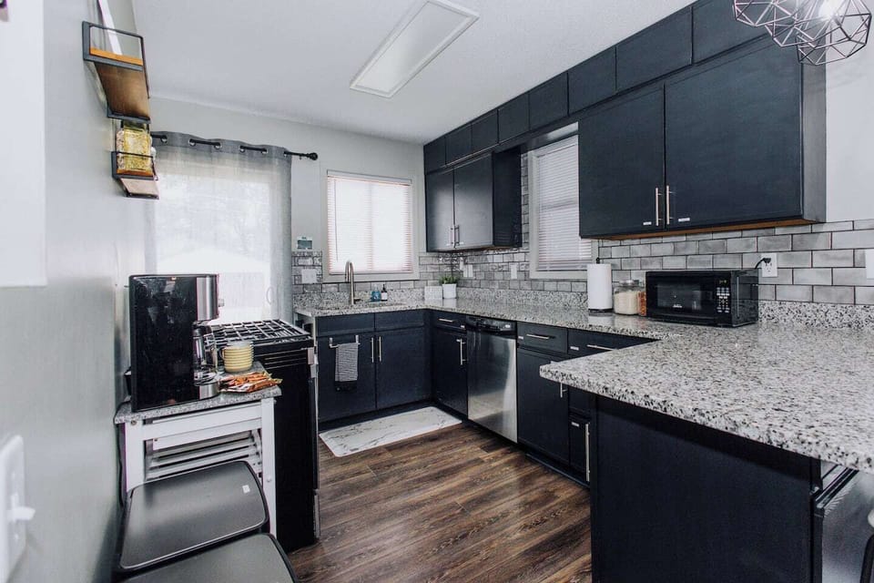 Fully stocked kitchen for you to create your culinary creations! Or to just cook a frozen pizza!! Gas stove, dishwasher, microwave, coffee maker, toaster, blender and a fridge around the corner!