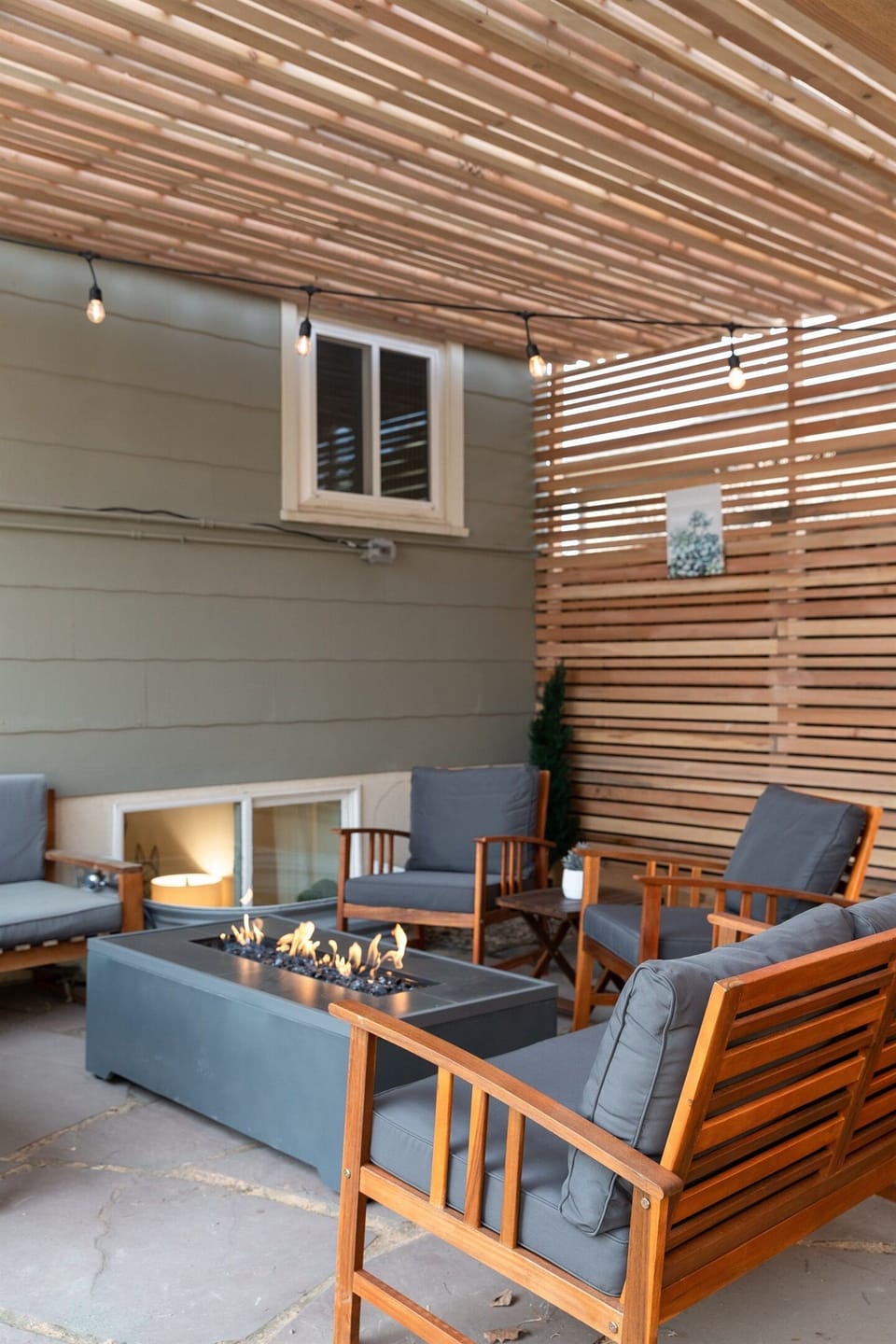 Cozy up and gather around the firepit in our covered patio