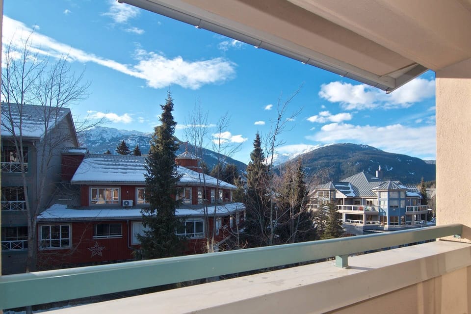 Deck view of the Village stroll and mountains