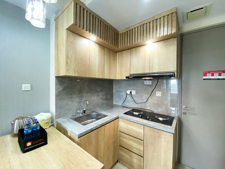 Apartment | Private kitchen | Full-size fridge, stovetop