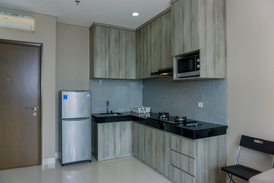 Apartment | Private kitchen | Full-size fridge, stovetop