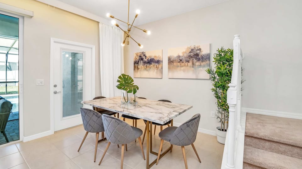 Experience the joy of shared meals in our inviting dining area, providing you with a cozy and welcoming space to gather with loved ones during your stay.