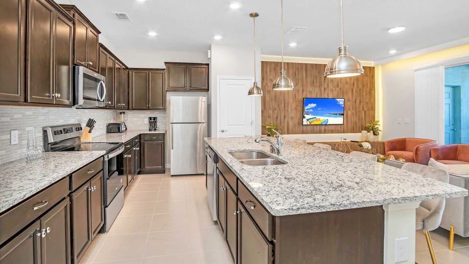 Unleash your inner chef in our modern kitchen, complete with top-of-the-line appliances for your convenience.