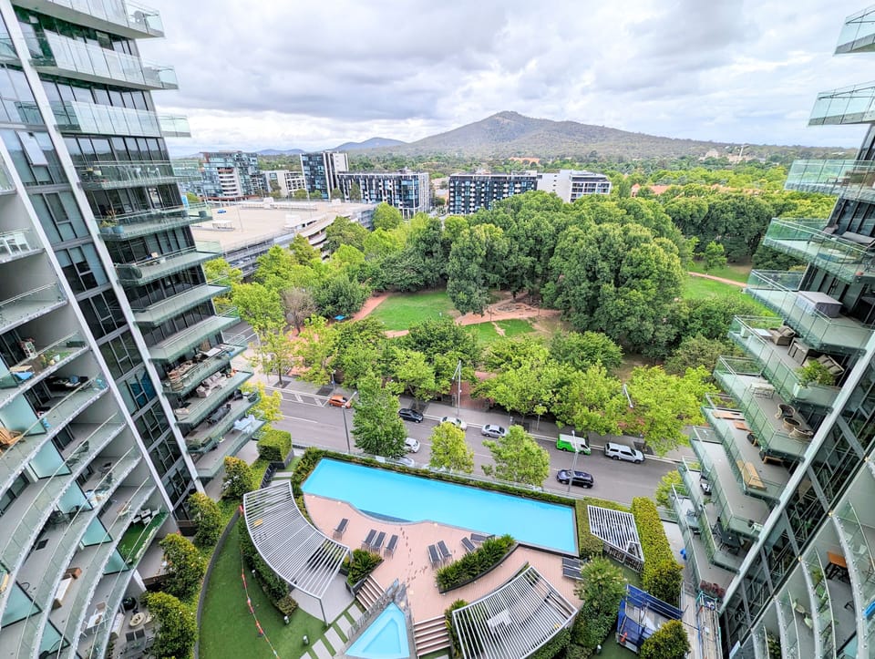 View looking down onto the roof top pool and BBQ area