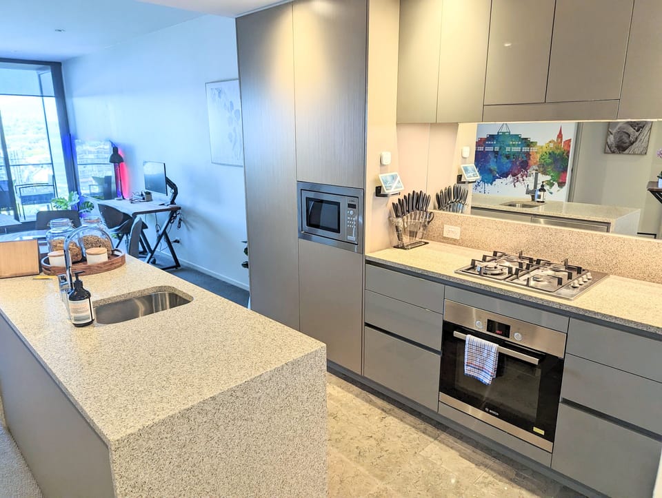 Kitchen with oven, stovetop, microwave, dishwasher and more
