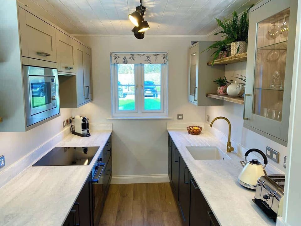 Brand new luxury kitchen, everything you need to prepare meals at home or a Nespresso Coffee to kick start your day. Fitted with every convenience and high spec equipment you can prepare the perfect feast for your alfresco meal on the lakeside deck. 
