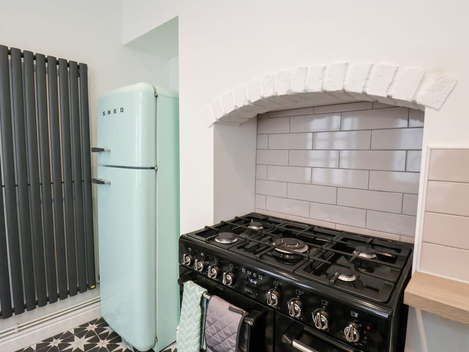 Fridge, electric kettle, toaster, cookware/dishes/utensils