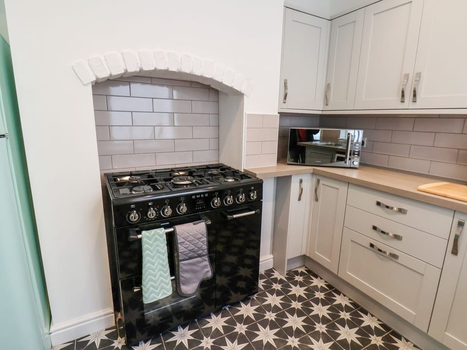 Fridge, electric kettle, toaster, cookware/dishes/utensils