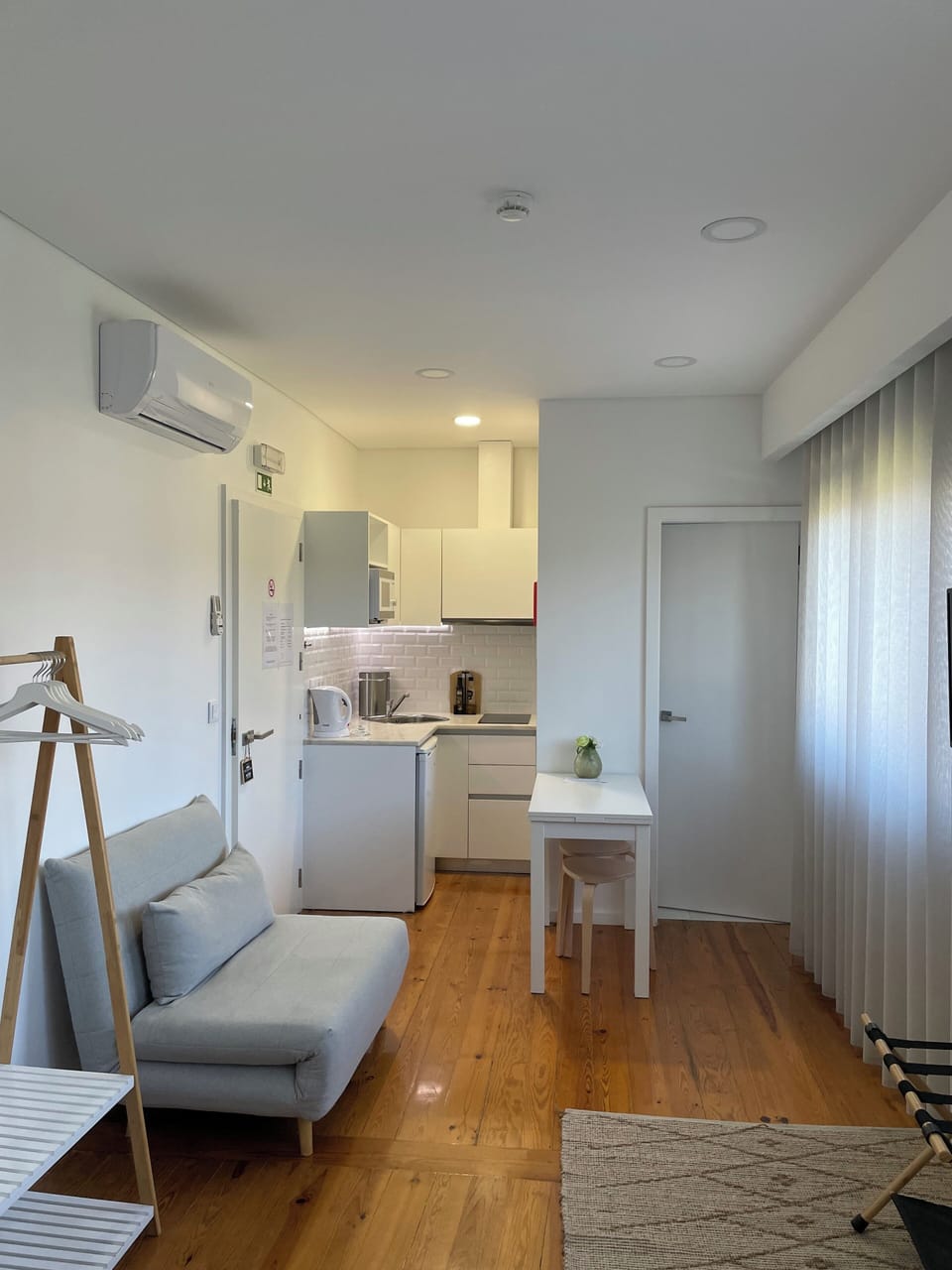 Basic Studio Suite | Private kitchen | Full-size fridge, microwave, toaster, highchair