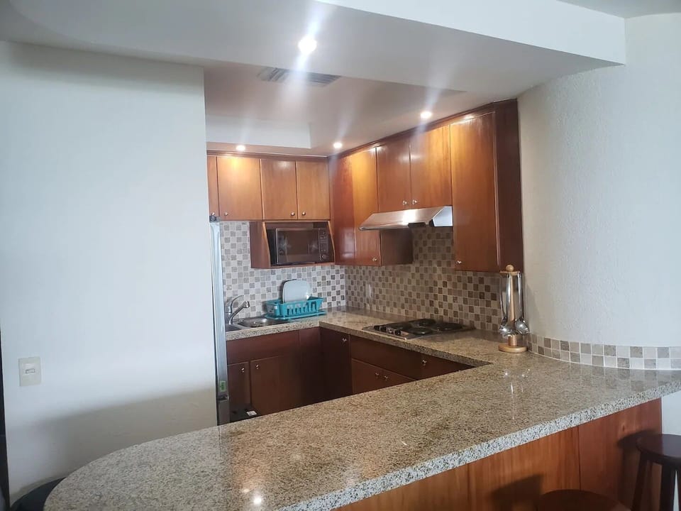 Family Condo | Private kitchen | Cookware/dishes/utensils