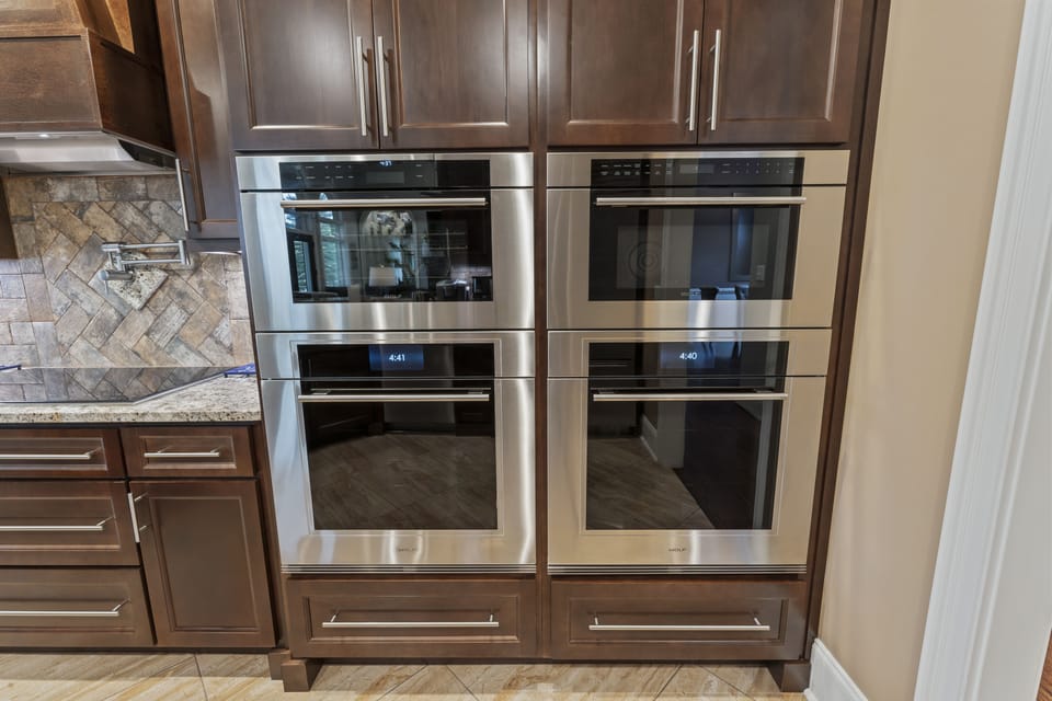 Wolf double ovens, microwave, and steamer