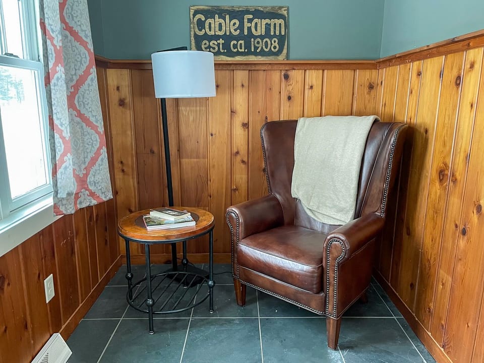 Tuck yourself out of the way and hunker down with a good book here