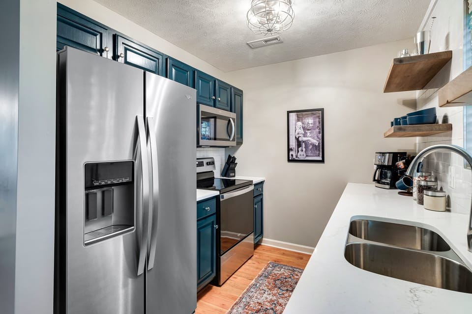 New quartz countertops, new stainless appliances, even a Kitchen aid mixer