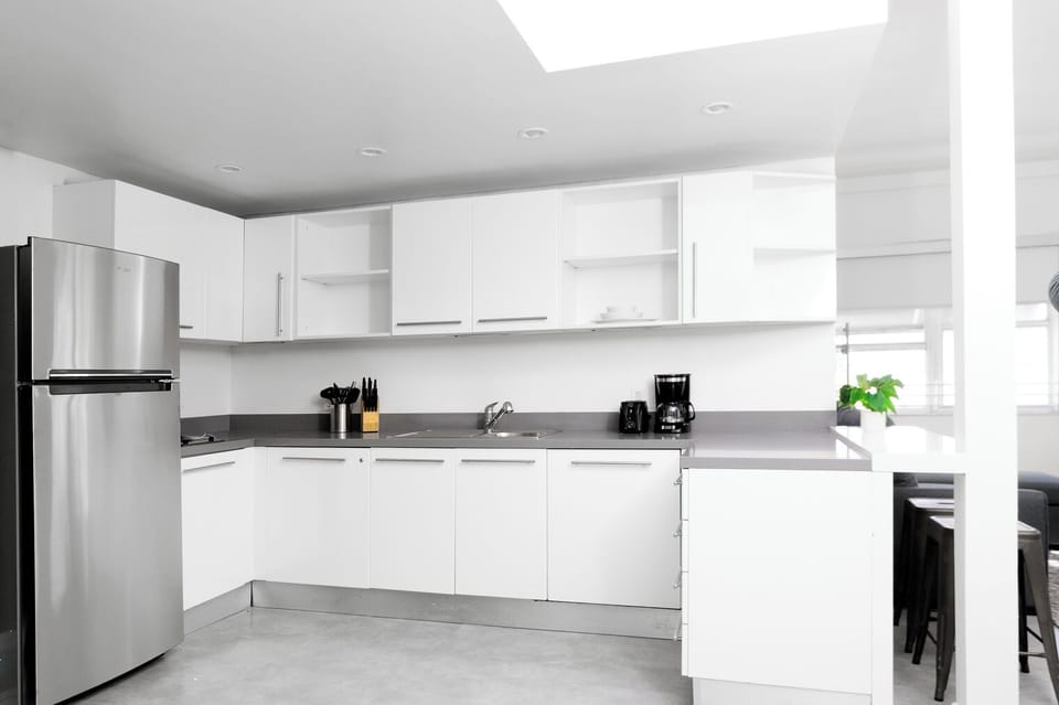 Superior Apartment | Private kitchen | Full-size fridge, microwave, stovetop, dishwasher