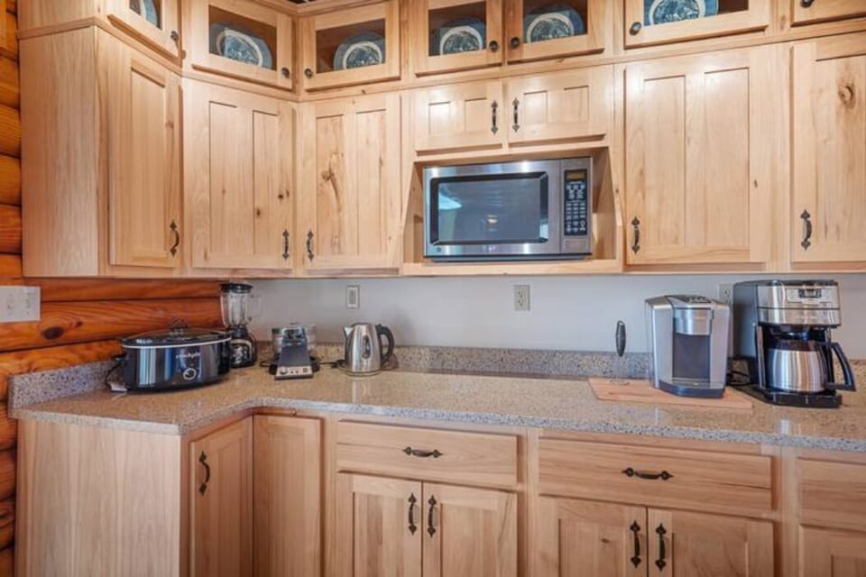 Some of the kitchen appliances, including 2 coffee makers and more
