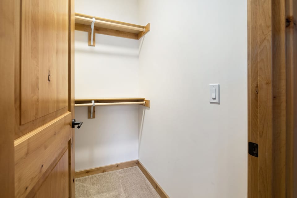 Walk-in primary closet.