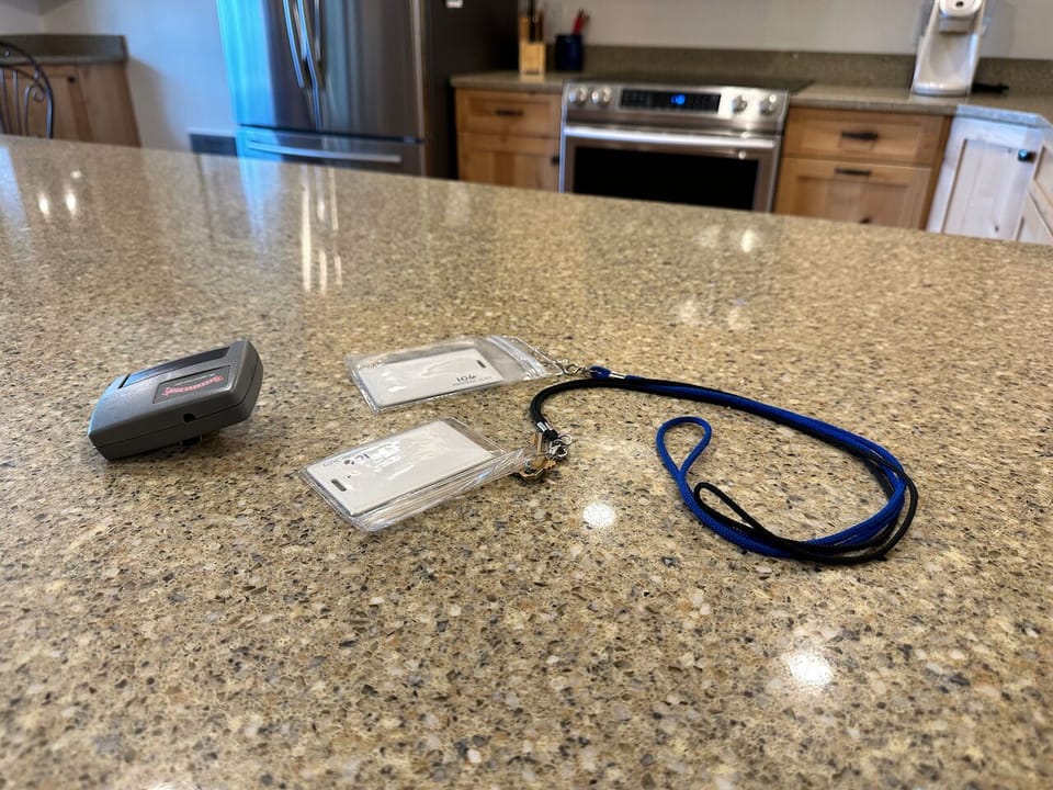 Garage door opener and two key cards provided.
