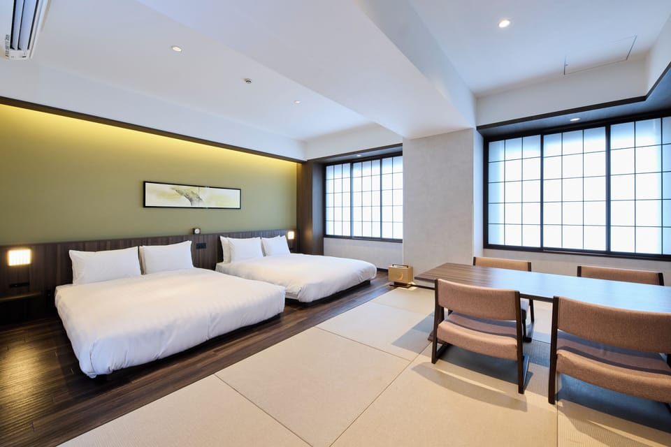 Deluxe Family Room (Literature) | In-room safe, free WiFi, bed sheets