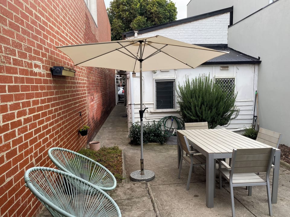 Rear entertaining area with secure side access  to the street