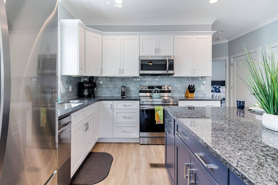 Large well-stocked Chef's Kitchen with plenty of prep & serving spaces.