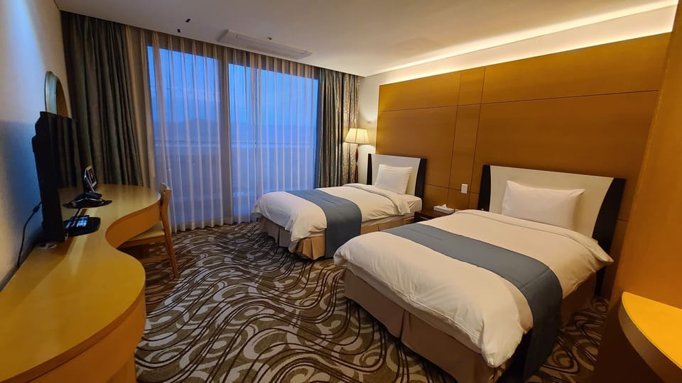 Premium bedding, individually furnished, desk, blackout drapes