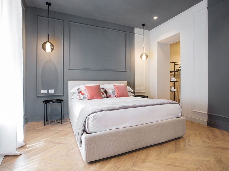 Triple Deluxe Room | In-room safe, blackout drapes, soundproofing, iron/ironing board