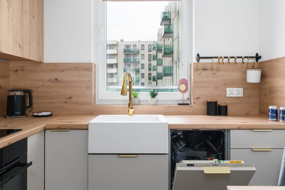The kitchen offers a functional layout for convenient cooking. 