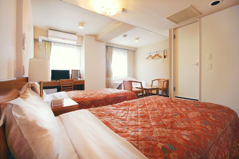 Twin Room with Sofa Bed, Non-Smoking | Desk, free WiFi, bed sheets