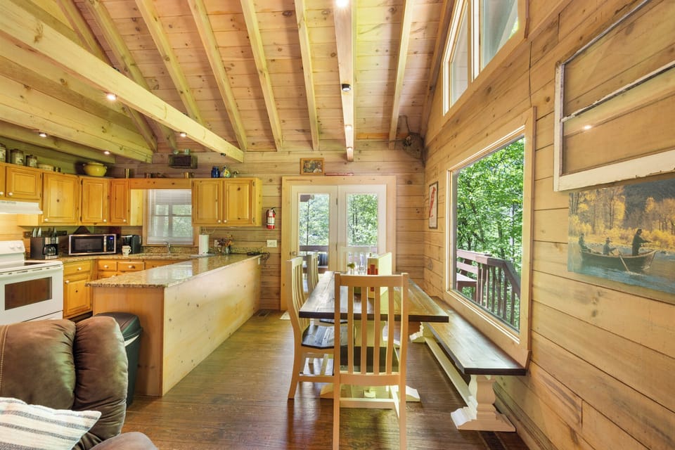 Enjoy your meals at the table while taking in the lovely view of the lake and surrounding mountains