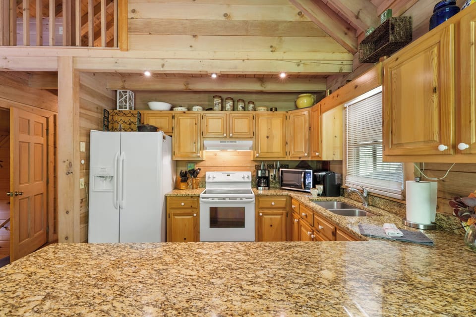 Granite countertops at this luxury cabin rental in Ellijay 